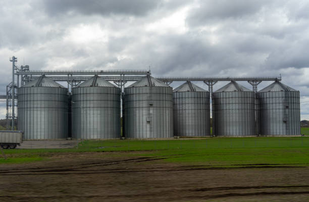 A modern granary in a field in a suburb of Vilnius in early spring.