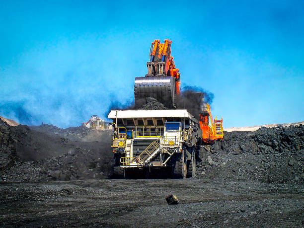 Loading the heavy dump truck at an open cut coal mine in Queensland's